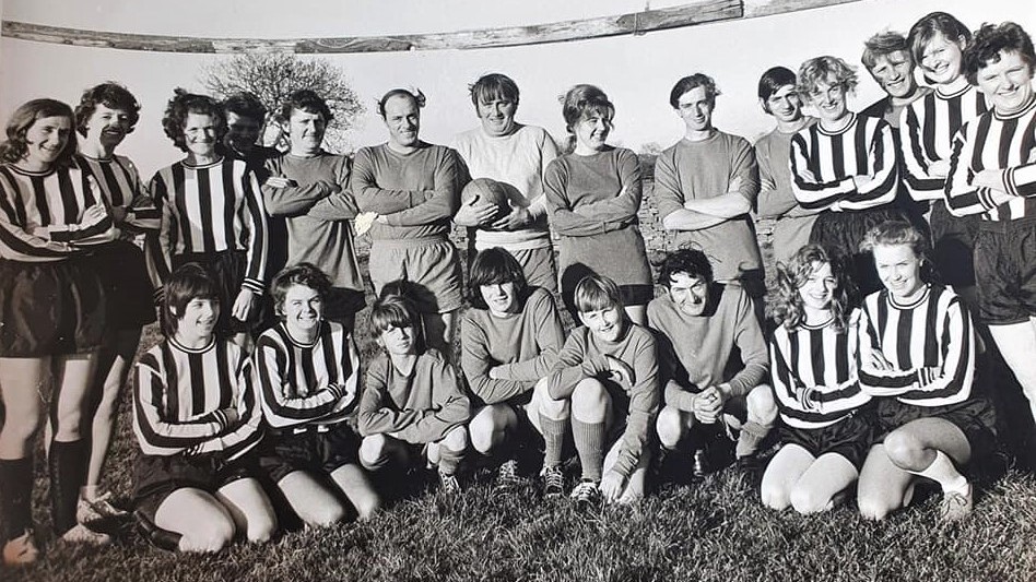 The football teams who helped fundraise to buy the Village Hall